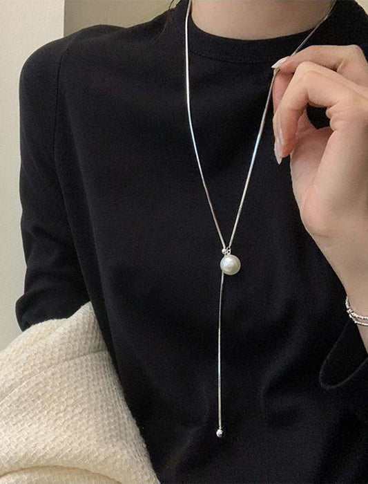 長さが調整できるイミテーションパールネックレス
