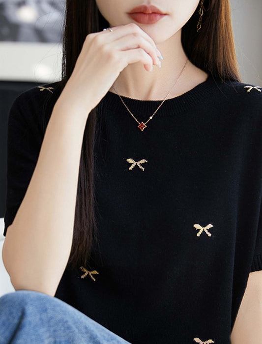 リボンモチーフ付きニット