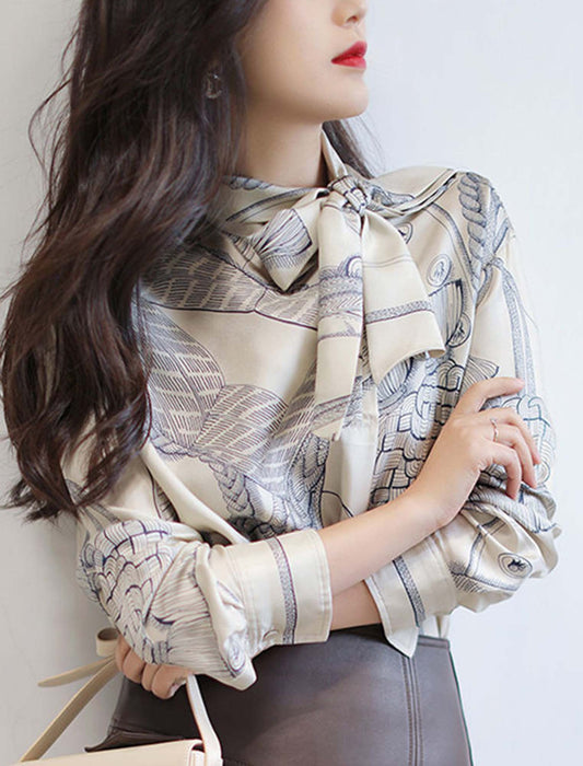 リボンタイプリントブラウス
