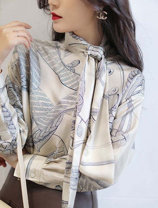 リボンタイプリントブラウス