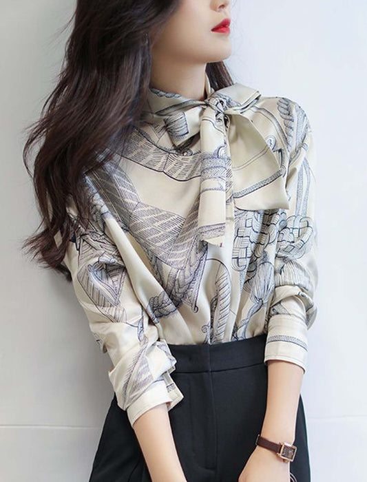 リボンタイプリントブラウス