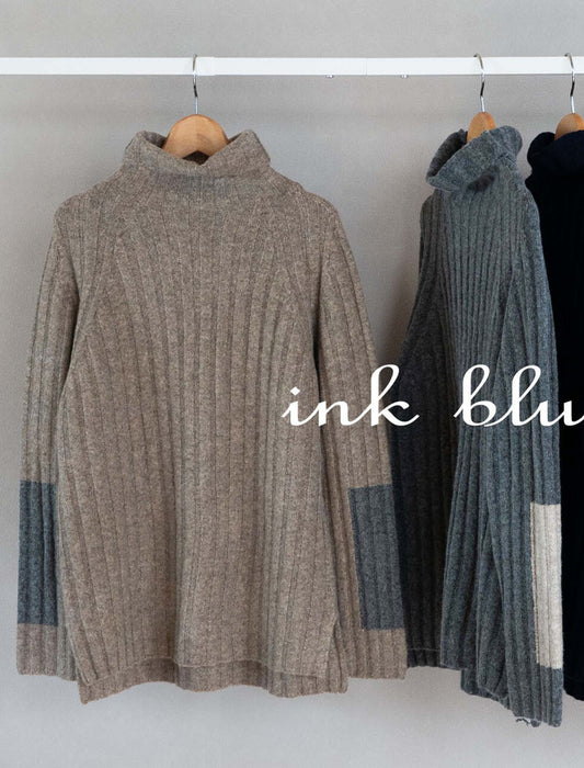 オフタートル袖パッチワーク風ニット